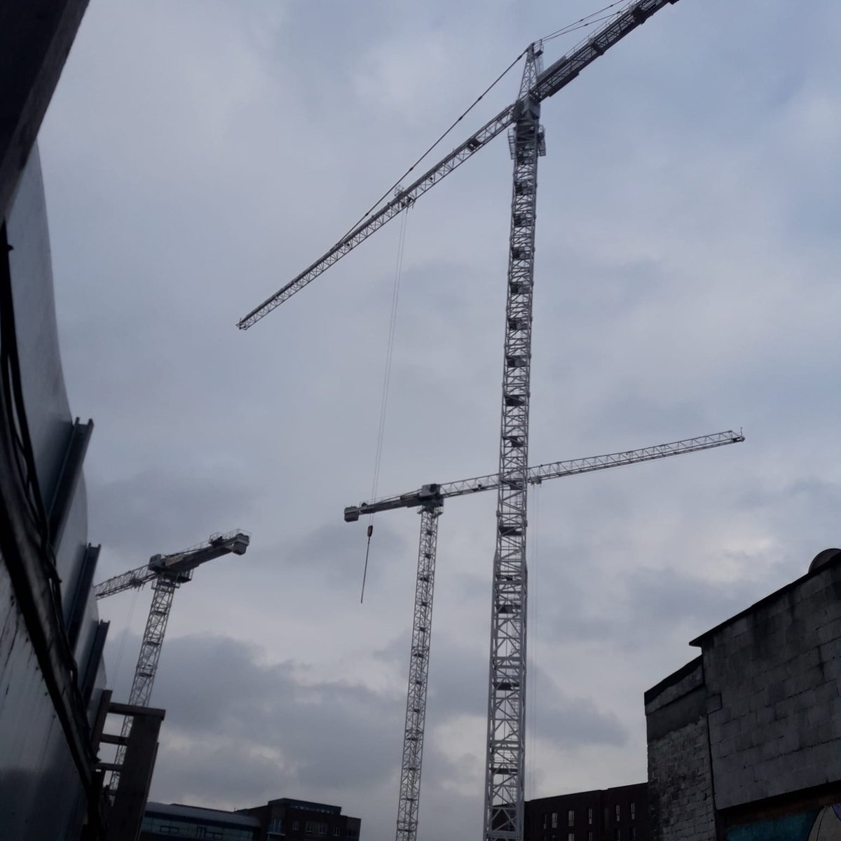 JJRhatigan's tweet photo. This week saw the erection of one of the tallest tower cranes currently on the Dublin skyline. Standing 87 meters high, this brand-new crane is the third of seven to be erected at our Charlemont Square site over the course of the project. #towercrane #construction #dublinsky https://t.co/CMjEl1TySx