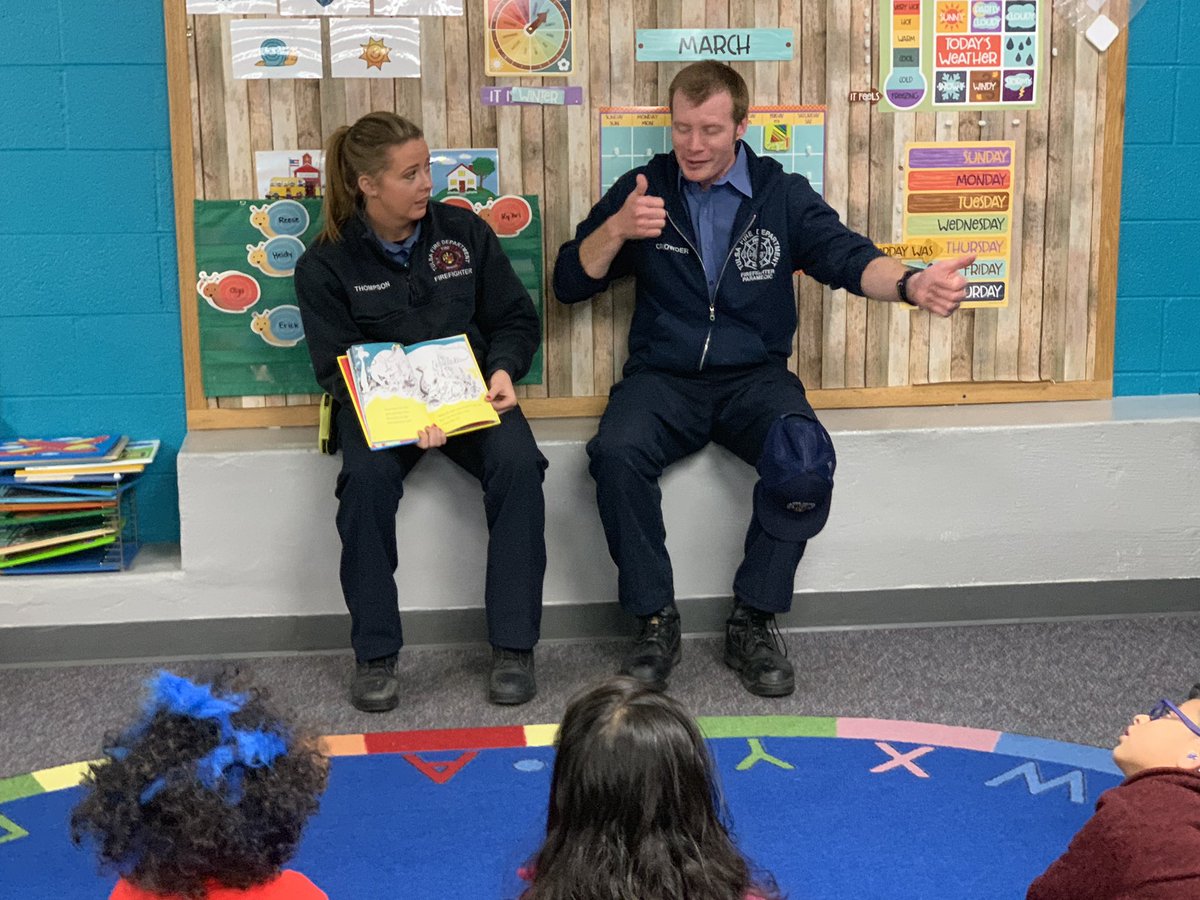 TulsaFire's tweet photo. Engine 20 and Engine 14 spent some time reading and signing from a Dr. Seuss book today at Wright Elementary. #Drseuss #firefighterreading #firefightersignlanguage #tulsafire #TFDEngine20 #TFDEngine14 #wrightelementary https://t.co/kUvYbDBped