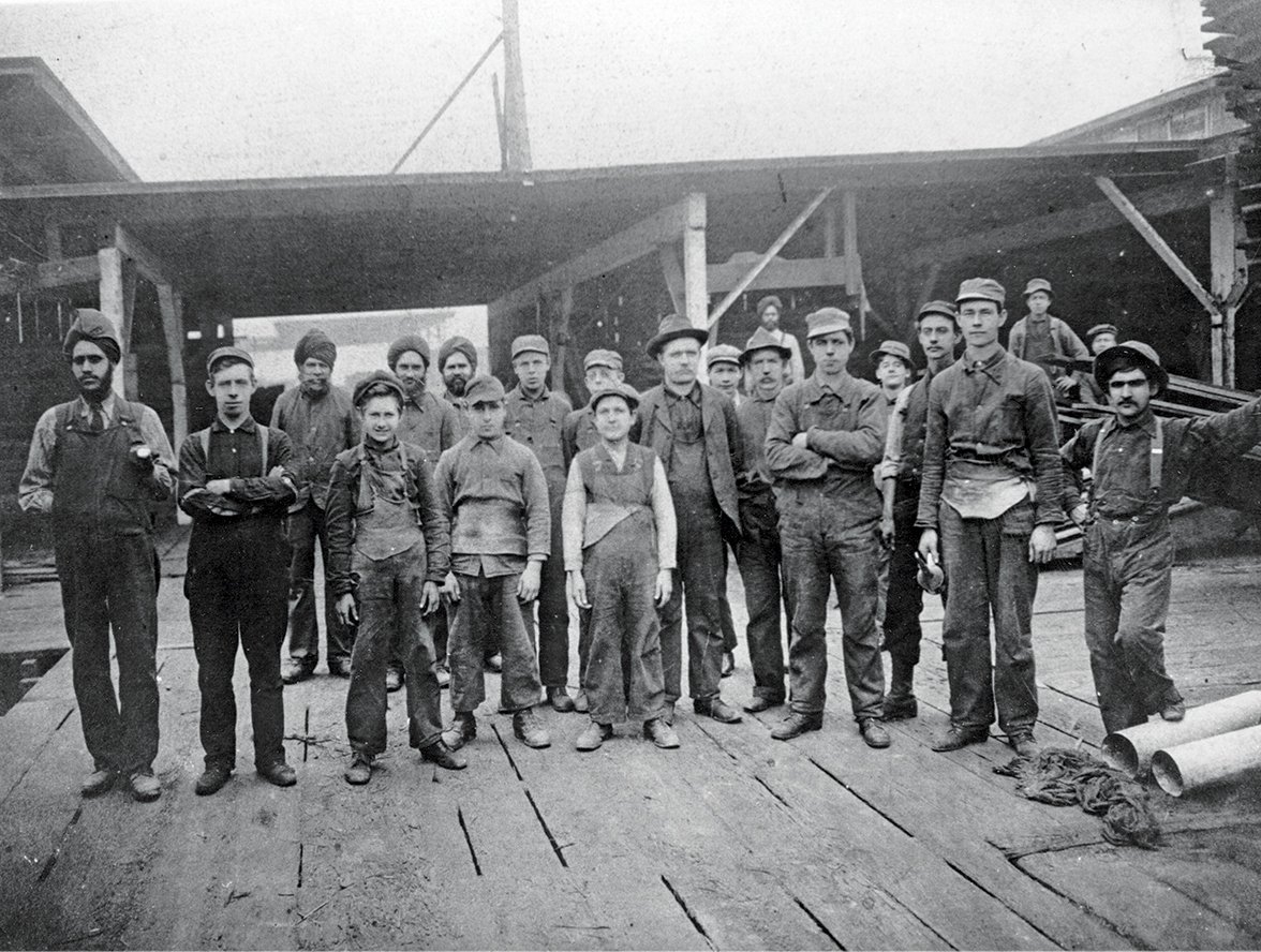 CityofPoMo's tweet image. Our calendar photo for March: Sawmill workers pose for a photograph circa 1912. J.S. Emerson built the mill in 1905 and sold it to Thurston-Flavelle in 1912. Today, it's the last operating sawmill on Burrard Inlet. #portmoody