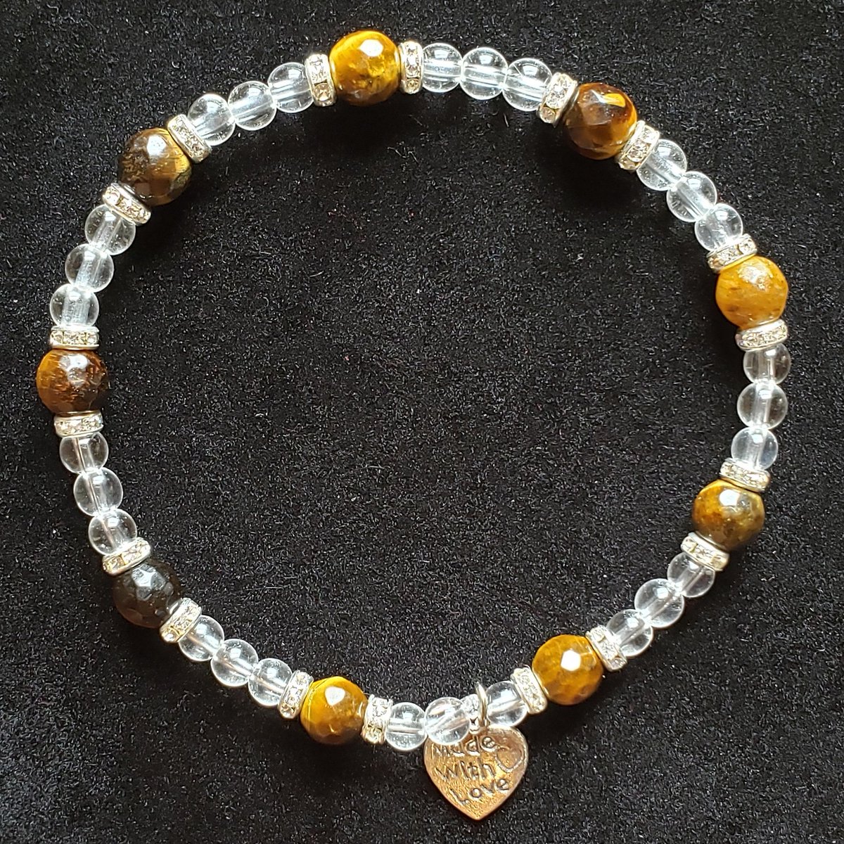 NubiaTouch's tweet photo. #quartz and #tigerseye #bracelet #beadjewelry #healingjewelry #happiness #weightloss #balance #chakras #touchofnubia❤🖤💚 #MadeWithLove😽 because I really do!!!!😽😽😽😻 https://t.co/HRRbEoHFeg