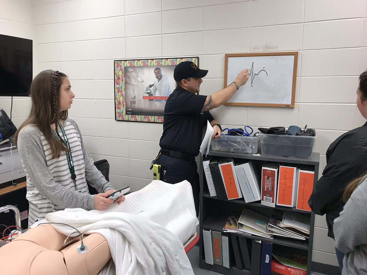 Paramedic Blake McCurry teaching PCT students at Lincoln High School. #goodasgold #@tcboecareertech