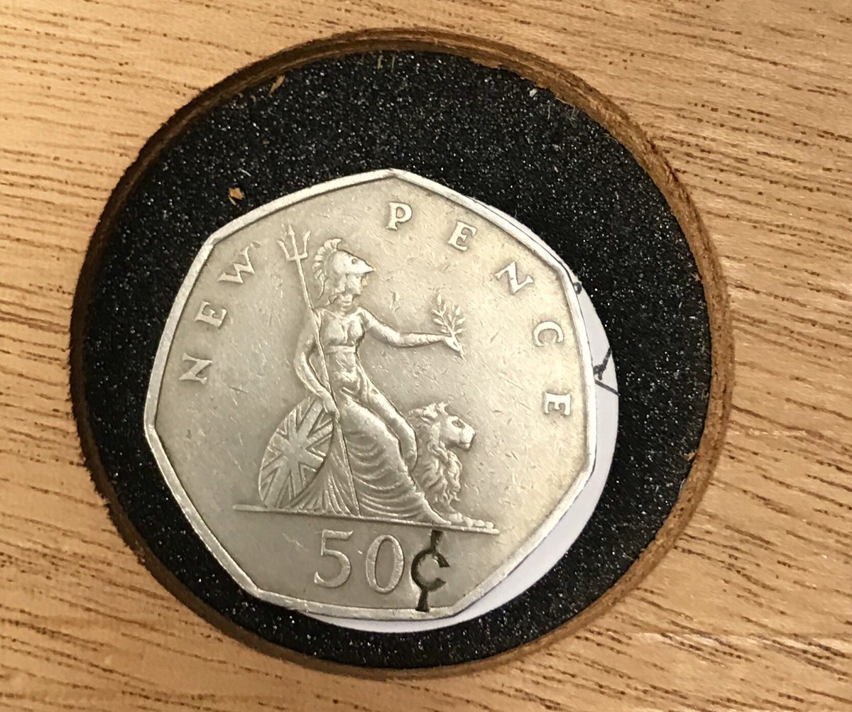 This was particularly interesting I thought: a 1969 fifty pence piece countermarked with a “cent” symbol. Anti-decimalisation and anti-Americanism all in one small punched character.