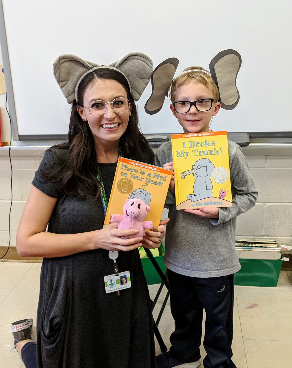 LMESArt's tweet photo. My daughter, Caroline, and I dressed as Gerald and Piggie for book character dress up today! I ran into some other adorable elephants and piggies today too! 🐷🐘❤️ #mowillems https://t.co/RTxsZDm0hO