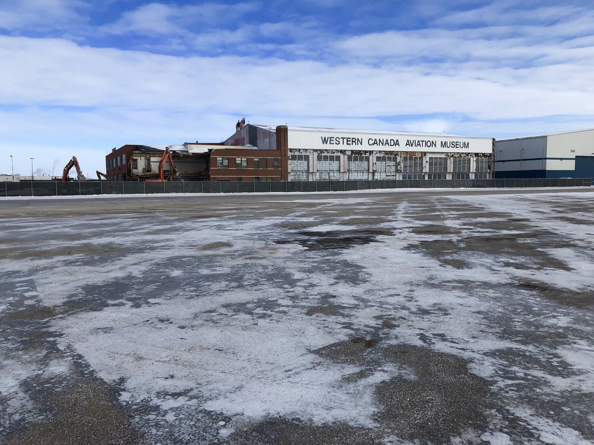 RoderLorne's tweet image. I had a chance to see the demolition of the old site of Royal Aviation Museum of Western Canada (formerly WCAM) from “air side”.  1./ the office space is half gone.  2./ you can see through the building since the Bush Plane Gallery is gone.  3./ Library &amp;amp; Archives is ALL gone.