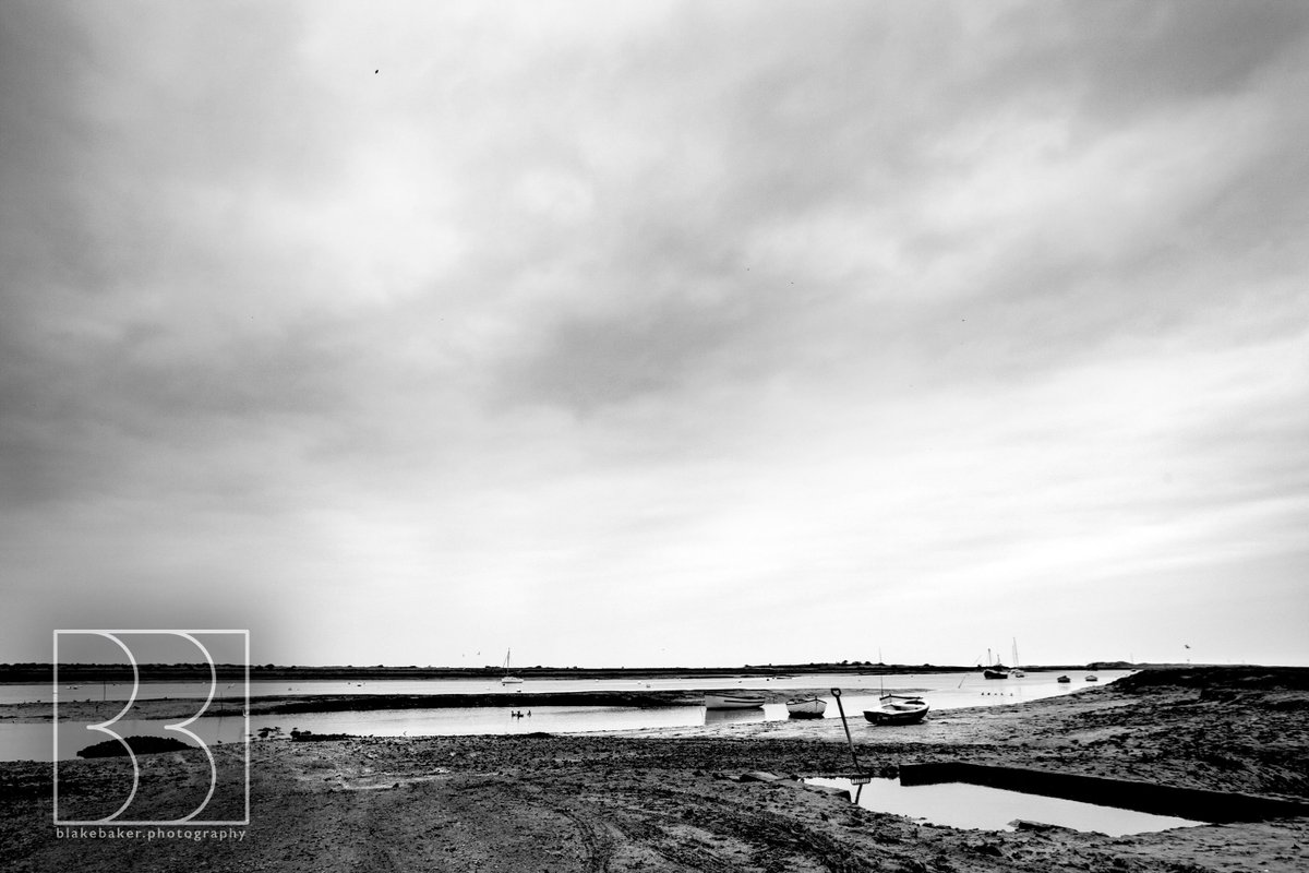 _Blake_Baker's tweet image. Very flat skies this afternoon, but exploring #BrancasterStaithe was great fun. So many views! The fork in the foreground caught my attention, followed by the sweeping lines of the reflections. #BlackAndWhite gives it a timeless feel.