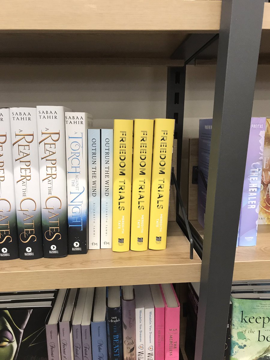 mltate24's tweet photo. Was pretty cool walking into a NYC BN yesterday and seeing #FreedomTrials! (And Freedom Trials always loves hanging out with @ElizabethTammi's Outrun the Wind!) https://t.co/DmZEF6bSrB