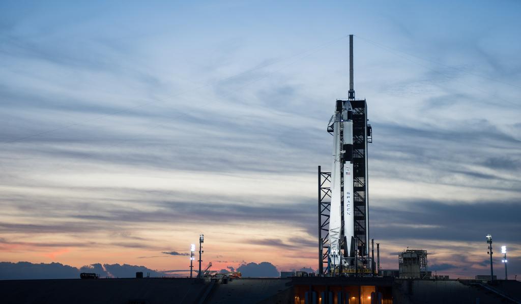 NASA's tweet photo. Soon, there will be a Dragon on its way to space! 🐉 Set to launch at 2:49am ET on Saturday, March 2, @SpaceX’s #CrewDragon is vertical and set for its mission to the @Space_Station. Learn more about how we will #LaunchAmerica: https://t.co/cg2mSfoPfM https://t.co/lWPbIWFKyP