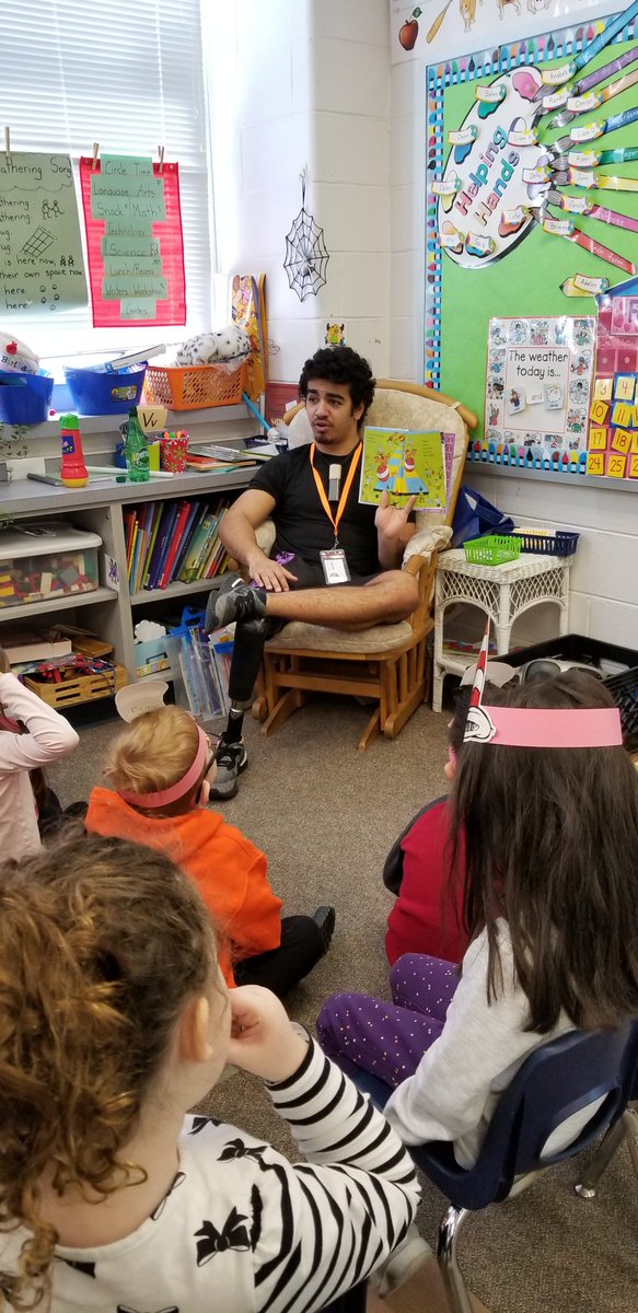 pusinka18's tweet photo. What a fun day! Officer Keil and my nephew came to read to us (unfortunately I messes up Officer Keil's picture 😥) Thank You! #drseussday @_RamsRock https://t.co/6uXkzZ4pvs