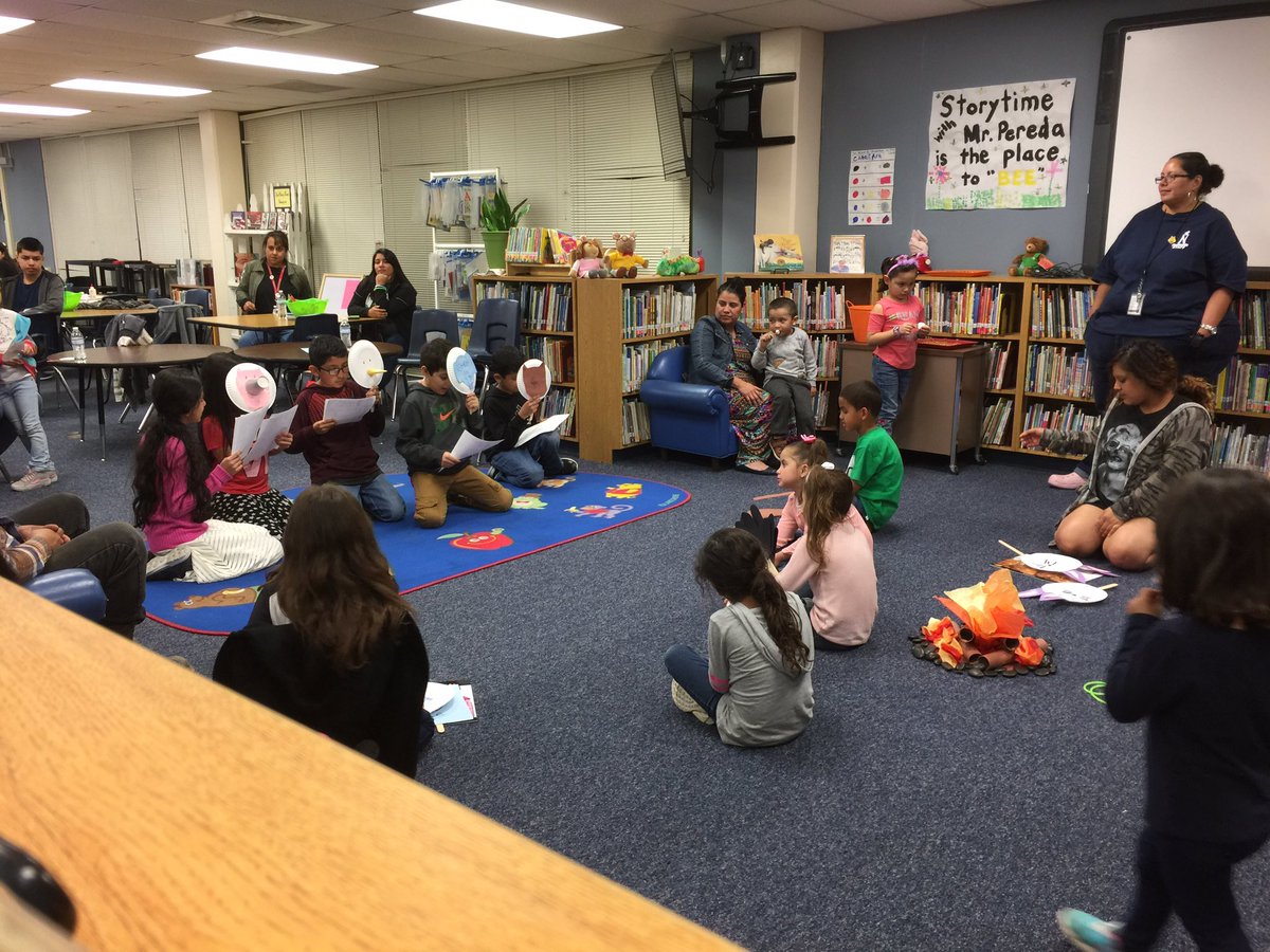 LT_AlejandroB's tweet photo. Family Friday at Camp Westwood was awesome! Students read aloud among the imaginary campfire and had a great time with friends! #NISDLearningTre #NISDWWT https://t.co/D0pEKAfPUJ