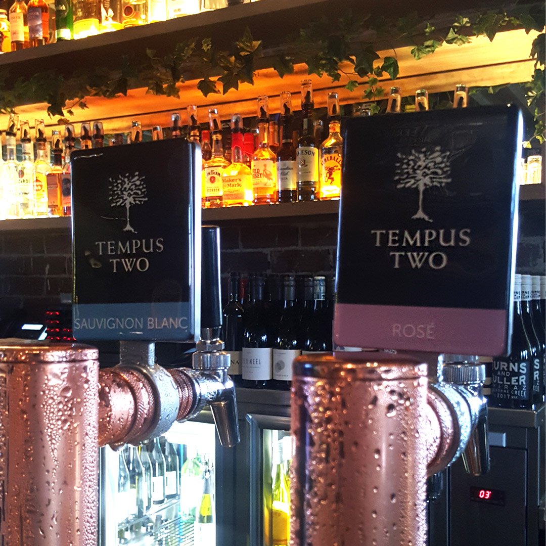 Wine o'clock never looked so good with @tempustwowines on tap! Catch it on happy hour for $5 from 4-6pm, Mon - Sat!  🍷