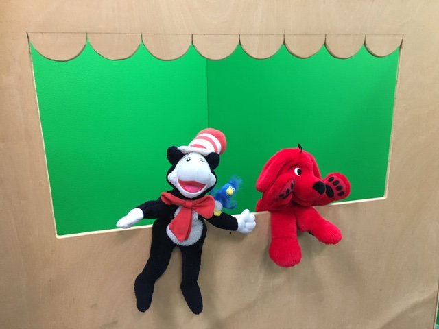 DavisESMedia's tweet photo. "Oh, the Places We Go" on the Davis News Network Morning Show.  Our puppets "Cat in the Hat" and "Clifford" delivered news for Seuss' birthday news show on Friday.  @HCPSDavisES @HCPSArea2 #hubofschool #davissailstosuccess https://t.co/MG6x1ipKWr