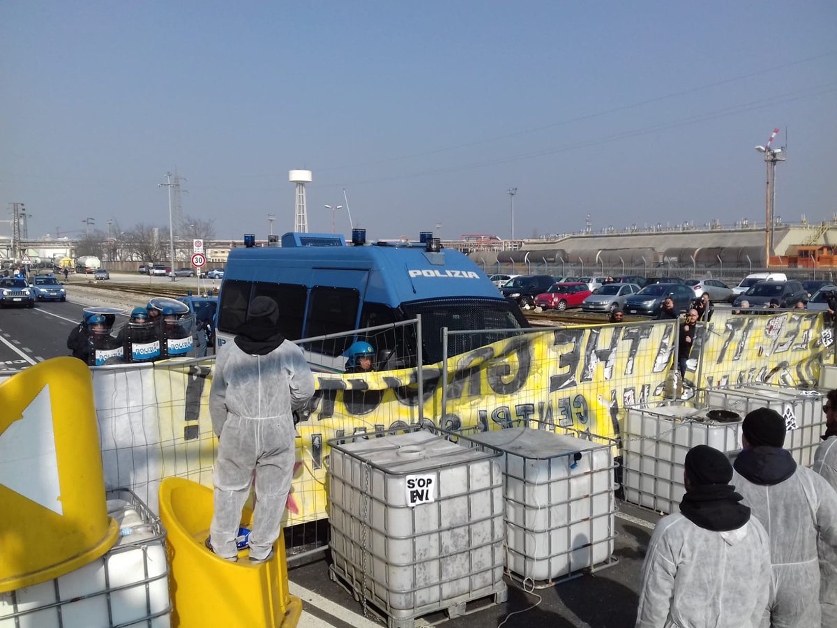 global_project's tweet photo. Police evacuate the area with an armoured vehicle. Activists left the refinery after more than 4 hours of blockade. Over 30 trucks and a 
Tanker were blocked all morning long. #ENI #StopEni #climatechange https://t.co/6Ygyp7vbdG
