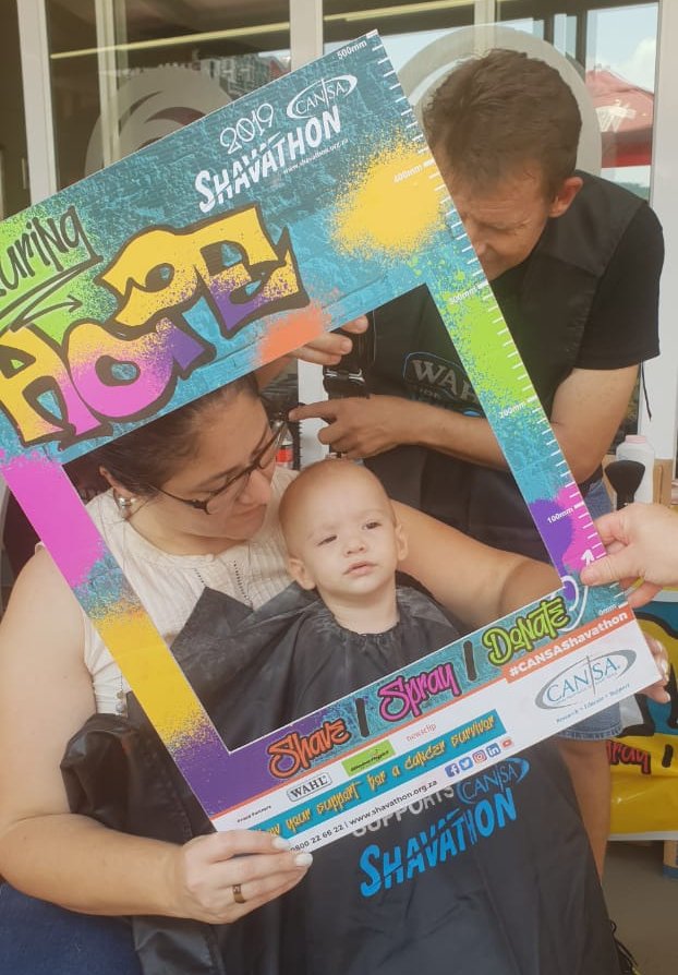 CANSA's tweet photo. This little cutie only turned 1 in February ~ he had his first haircut today at #CANSAShavathon in honour of grannies affected by cancer..

#ColouringHOPE https://t.co/uzlJ5N8nSm