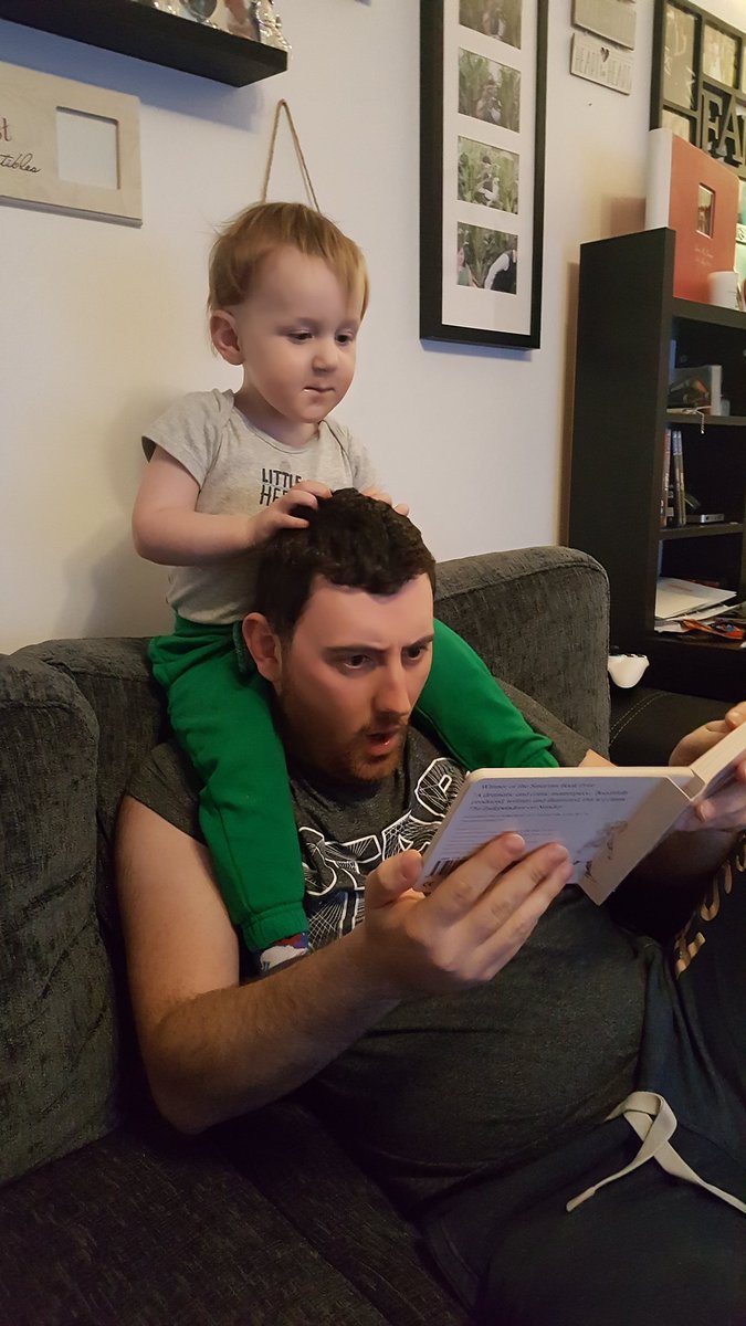 joanne_unsworth's tweet photo. My son and husband sharing the actual we're going on a bear hunt this time. #WhereWillYouReadBC @BartonCloughY1 @BartonClough https://t.co/hDByP7Cty1