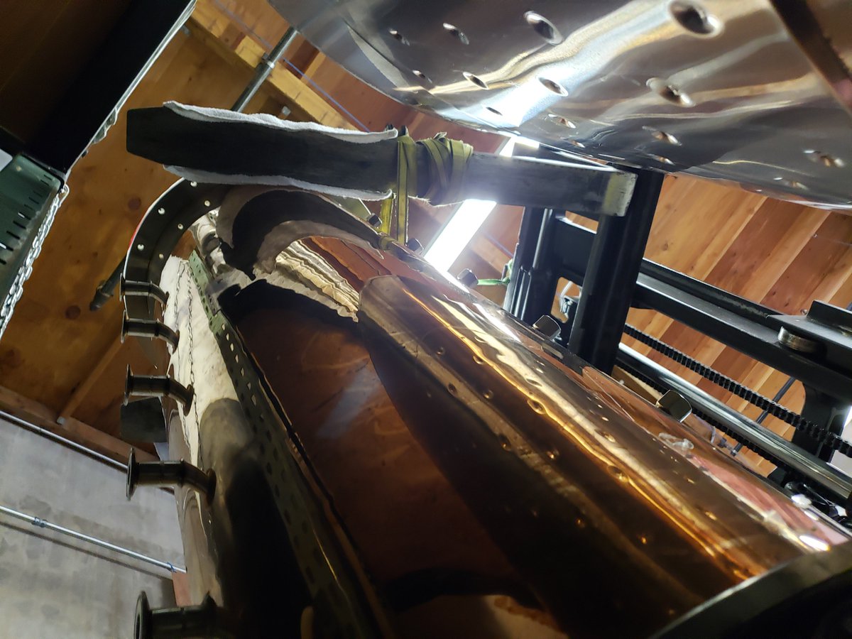NewAlchemyDistl's tweet photo. New distillation column and reflux condensor mounted and installed - now we just need to plumb the cooling and product condenser.  #distillation #forkliftsafety #craftspirits #whiskey #reflux #bubblecaps https://t.co/BXdHUekwAT