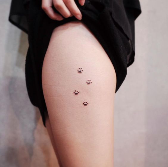Tattooforaweek's tweet photo. These tiny catpaw tattoos are purrrrfect for any animal lover! #catpaw #cattattoo #tinytat #tattooidea #ink #inked #inkspiration #tattootrend #tattoofun https://t.co/ceA6dSIZik