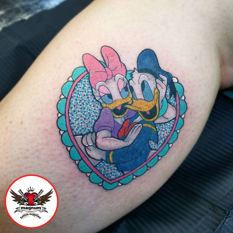 Donald Duck tattoo on the tricep
