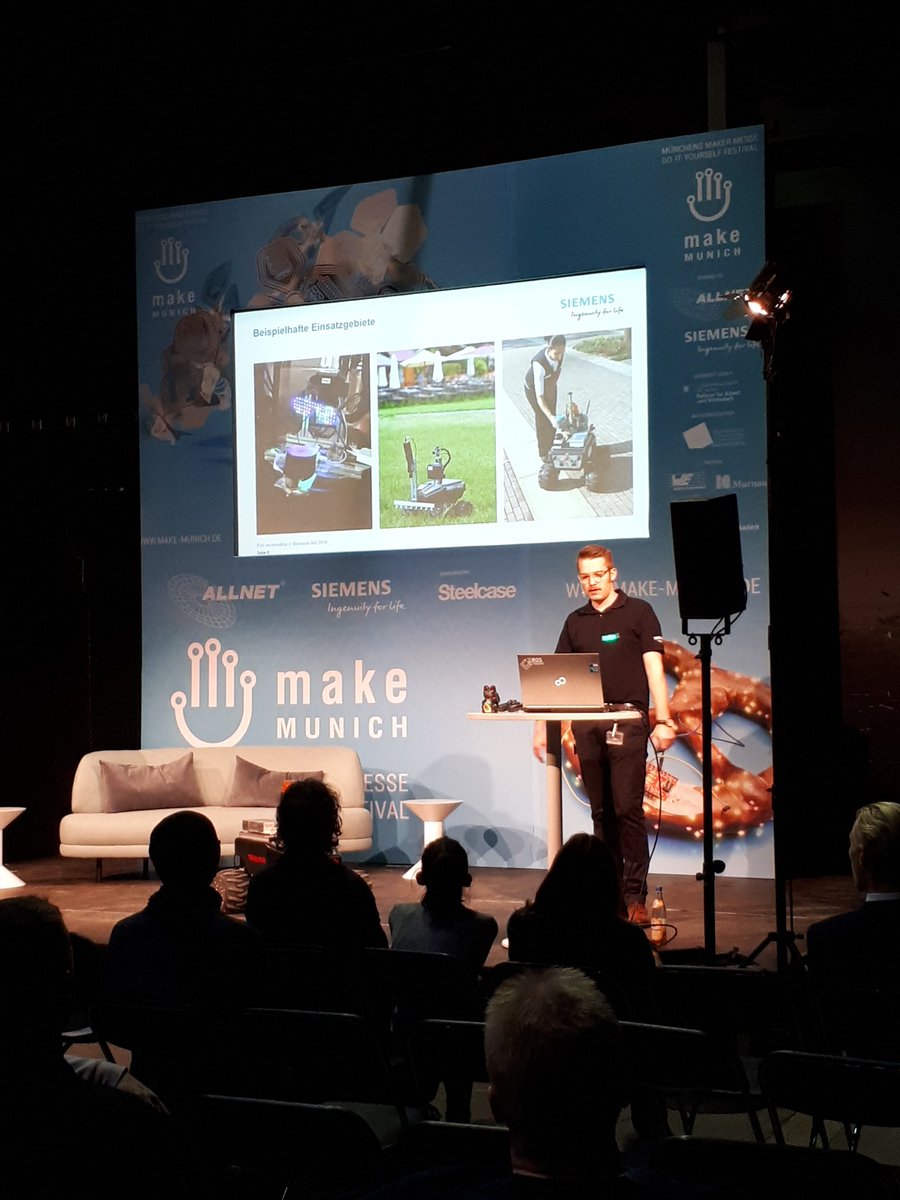 A_Loetzsch's tweet photo. Siemens students on fire 🔥😎 Cool stage presentations about Software Defined Inverter TAPAS and AGVs at #makemunich 
#teamsiemens
#makethefutureyours https://t.co/sqzTYL3VLb