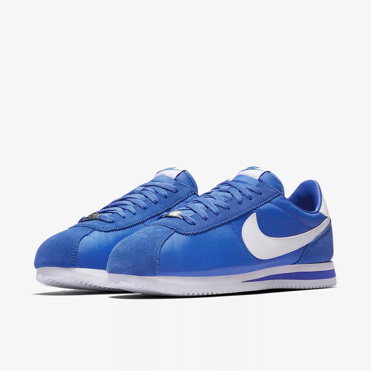 signal blue nike cortez