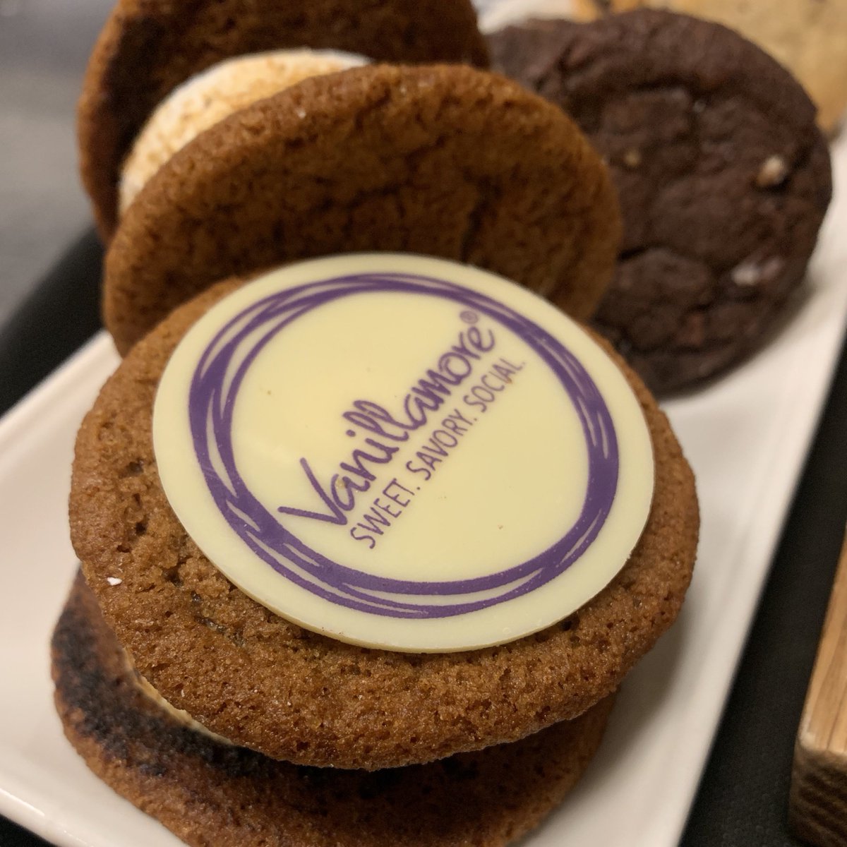 If our Ginger Molasses cookie wasn’t scrumptious enough, now you also get to bite into our logo. 😉 
.
.
.
.
#vanillamore #sweetsavorysocial #milkandcookies