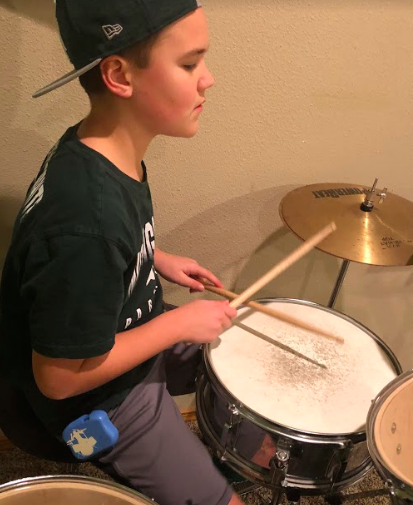 RooTainer's tweet photo. Rockin' that #RooTainer on the drums! You can wear our case anywhere, just pop it on your waist and you're ready to go. #crowdfunding #crowdfund #rocktheroo #kidsbrands #momlife https://t.co/L8cQNazDgv