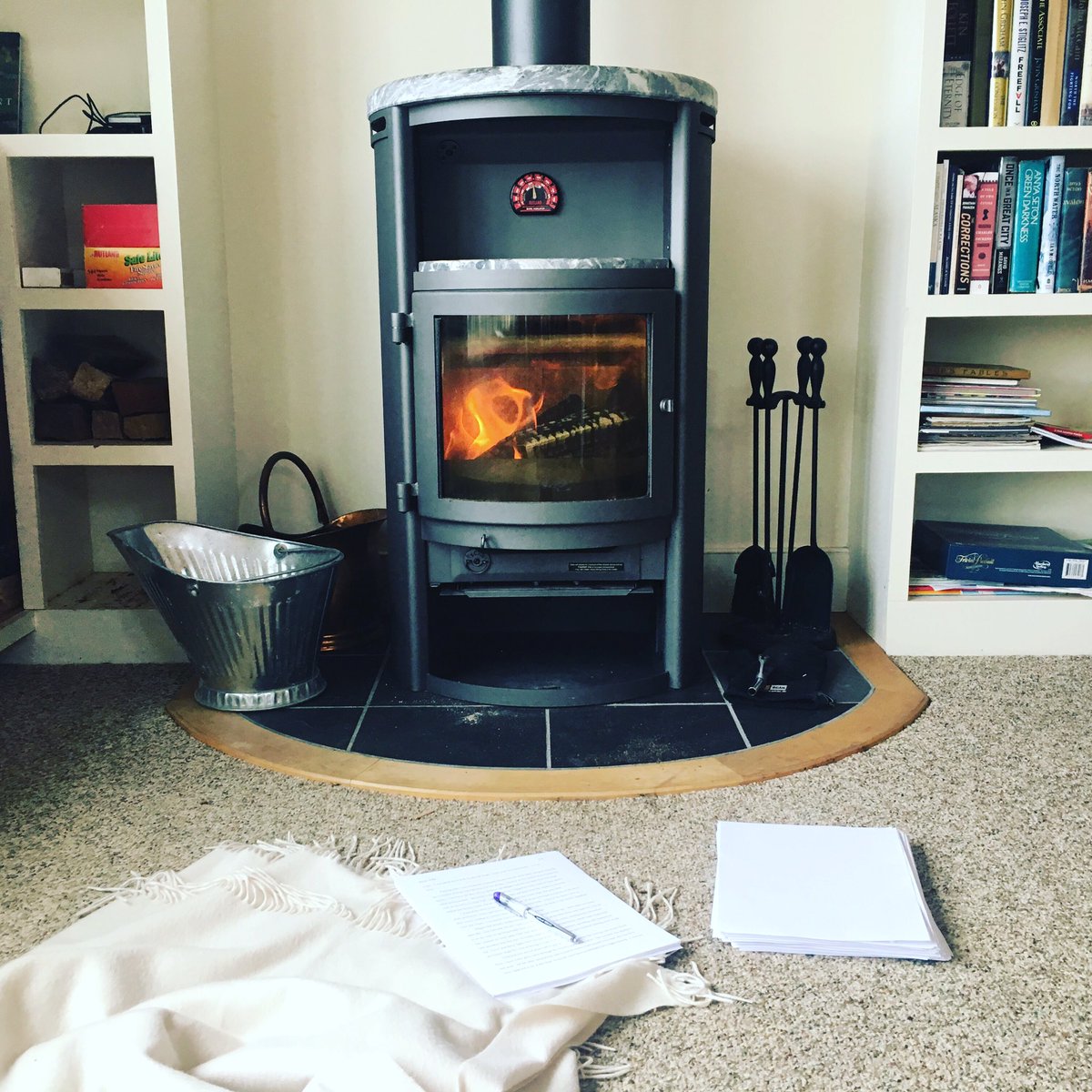 rwestonliterary's tweet photo. Curled up by the wood stove with a cozy #middlegrade manuscript. #amediting #weekendediting https://t.co/8HaeGznlE0