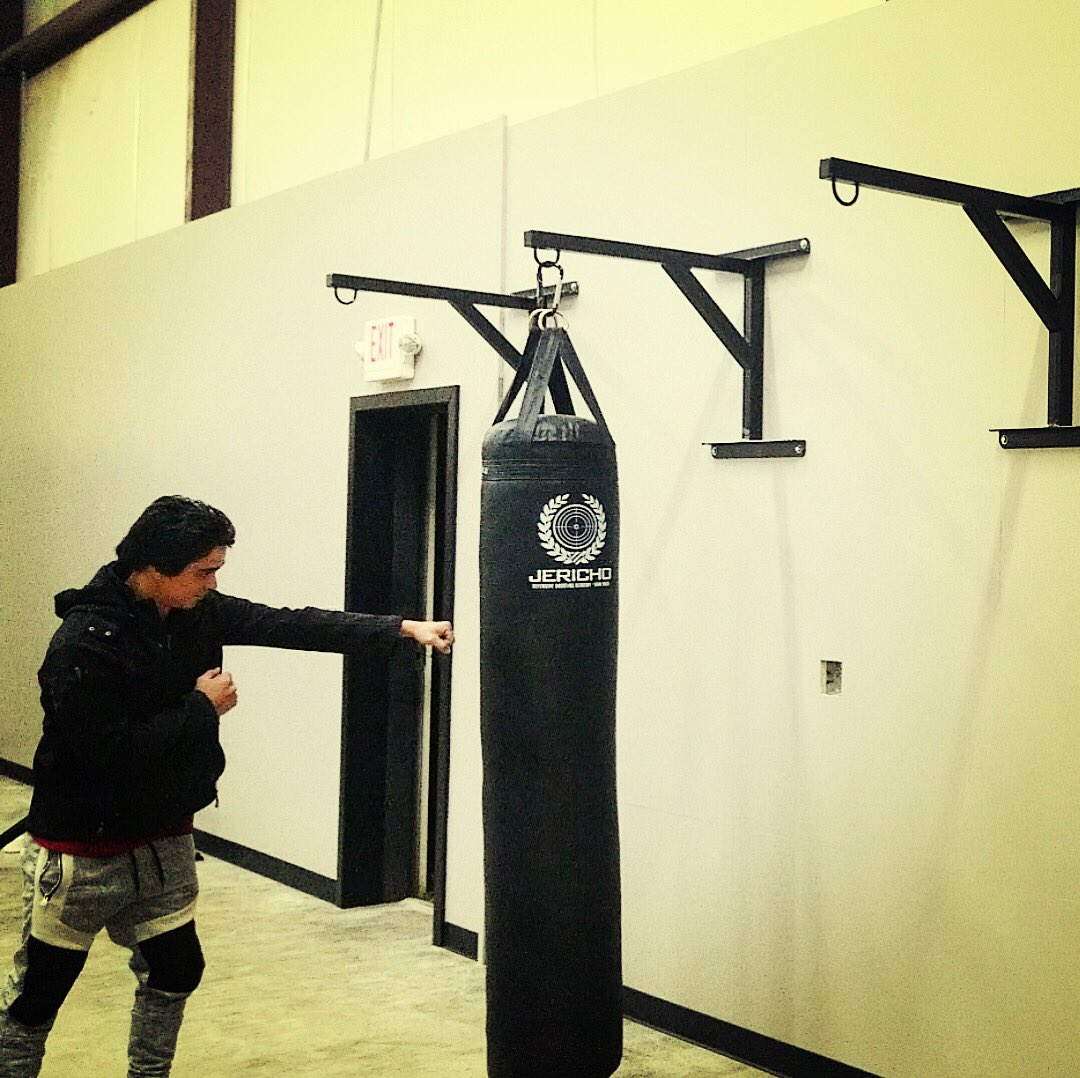 JerichoTactical's tweet photo. Ray is testing out our first installed bag in our brand-new studio. Thanks for all the hard work! 

#kravmaga #specialforces #israel #ufc #mma #martialarts #tacticaltraining #bootcamp #trainhardfighteasy #charlottenc #fitness #beastmode #gunsdaily https://t.co/BkGMxcZV4B