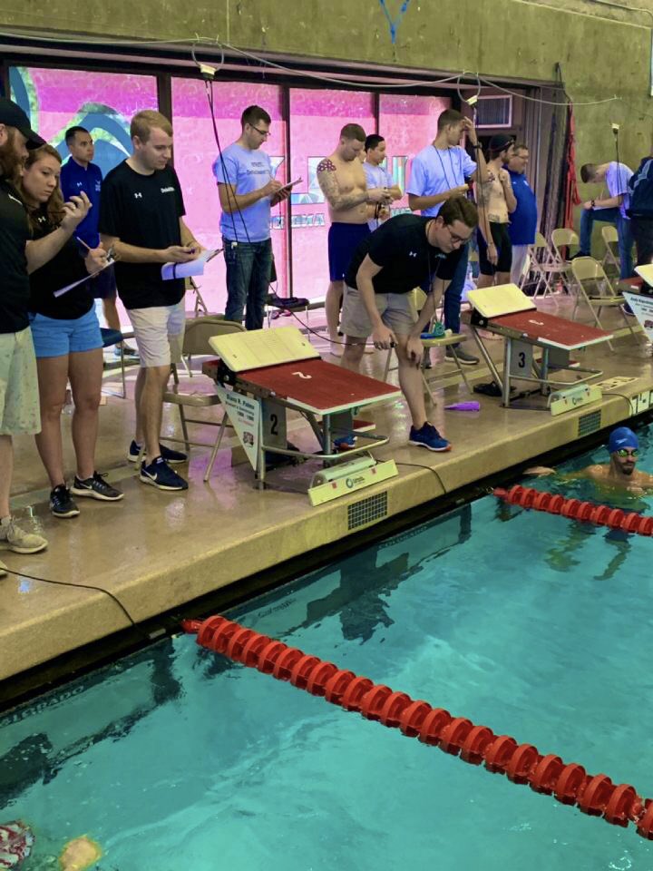 Team @DeloitteGov is #makinganimpactthatmatters as the back-up timers for swimming at the 2019 #AFTrials! #deloittesupports