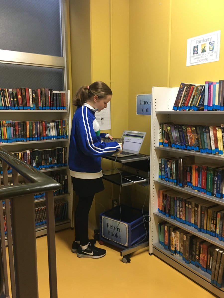 KAdelsboell's tweet photo. We are loving our new cool middle school library and check out system. What a great way to make use of the stairwell in our building @TISlearns https://t.co/2YUNMrucax