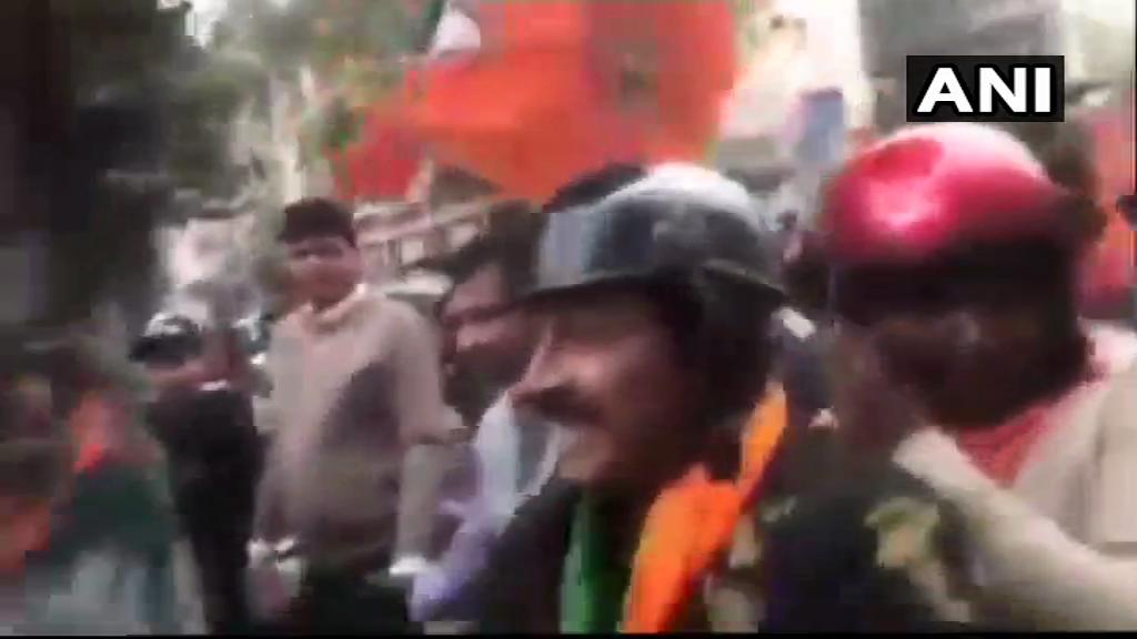 ANI's tweet image. Delhi: BJP MP &amp;amp; Delhi Chief Manoj Tiwari wore armed forces uniform during party&apos;s bike rally in Yamuna Vihar on 2nd March (Earlier visuals)