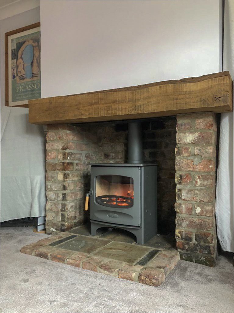 A recent @charnwoodstoves c-five blu we installed. Ecodesign Ready for 2022. #ecodesign #logburner #logburners #logburnerlove #woodburner #britishmade #charnwood #countrylife #cosy #interior123 #loungeideas #oakbeam #brickfireplace