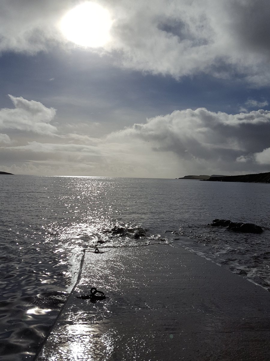 Hjetlandi's tweet photo. High tide at Da Nowst at #Hoswick - warm in the sun. Kinda sad to see the nowst without boats though. #Shetland https://t.co/cyYnFh94gH