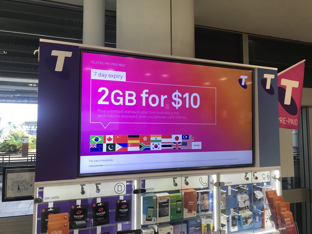 mgeist's tweet photo. Land in Australia and this is what I see coming out of customs: AU$10 for 2 GB of data + unlimited calls here and to Canada. Nothing remotely comparable in Canada. https://t.co/gzd0p2AcZF