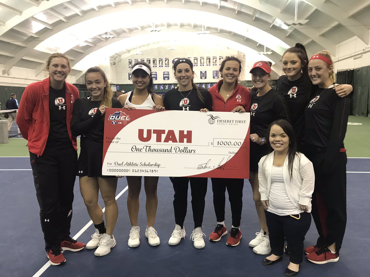 dfduel's tweet photo. Utah wins Deseret First Duel Rivalry Women’s Tennis 4-3 at BYU after a very close match, bringing the overall Duel Rivalry score to 20-12. The team receives a $1,000 scholarship check from Deseret First Spanish Fork Branch Manager Rebekah Barlow. Congrats Utes!! @UteWomensTennis https://t.co/35VgbkCjFc