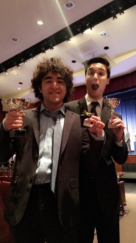 Quarterfinaling in JV Public Forum Debate, Sean Tu, Ethan Gabizon, and Brian the Plant!