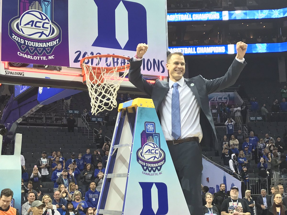 dukebasketball's tweet image. The coaching staff and managers are taking care of the other net.