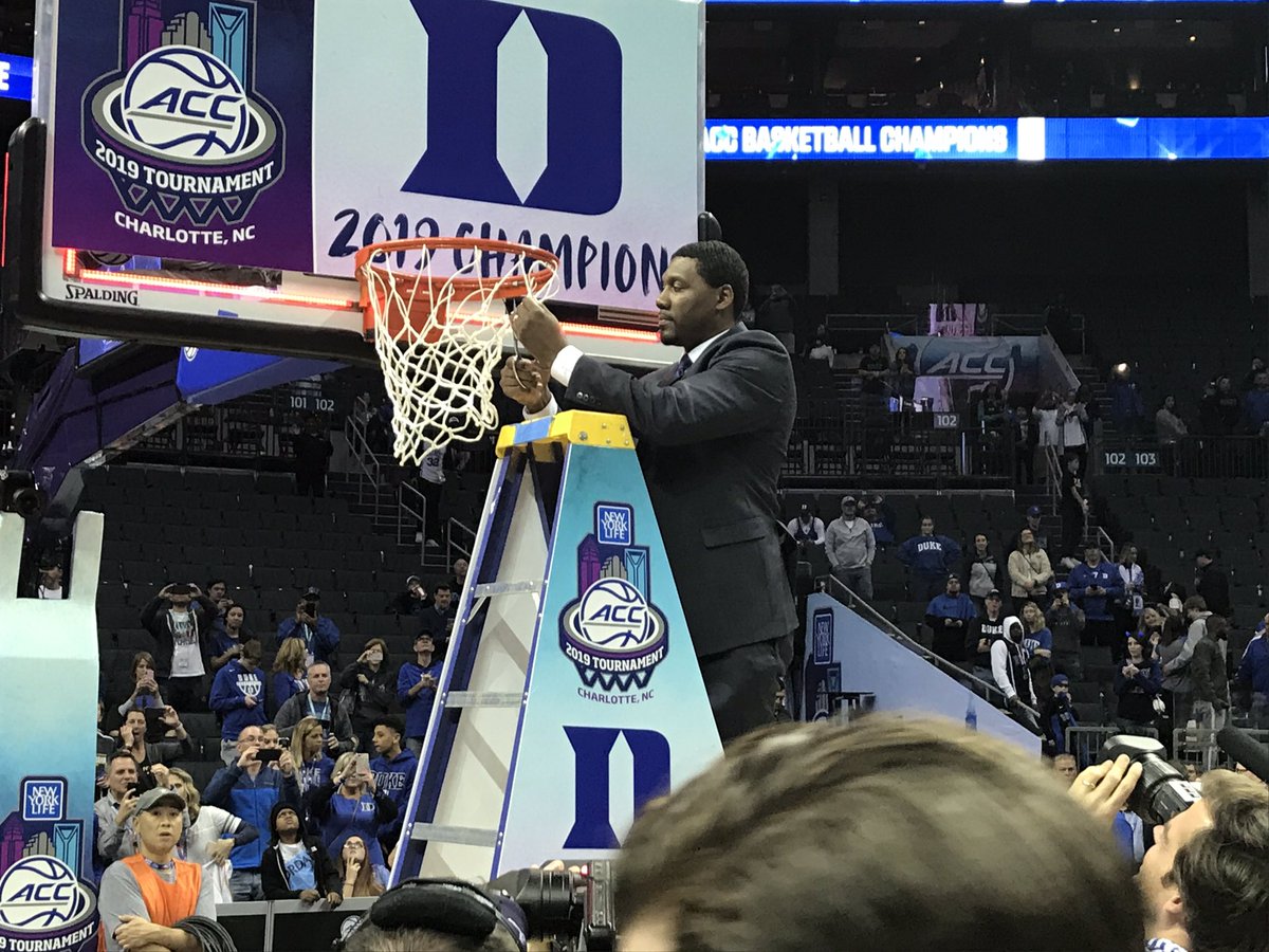 dukebasketball's tweet image. The coaching staff and managers are taking care of the other net.