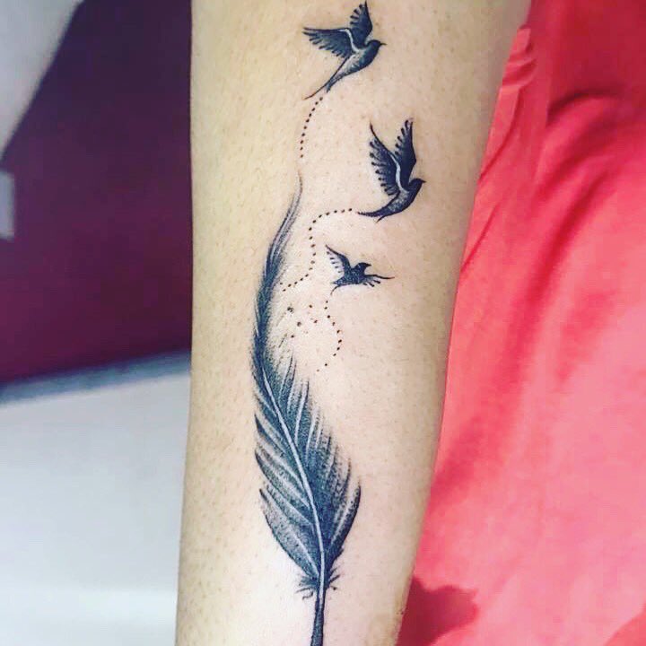 PINAKI BIRD FEATHER TATTOO