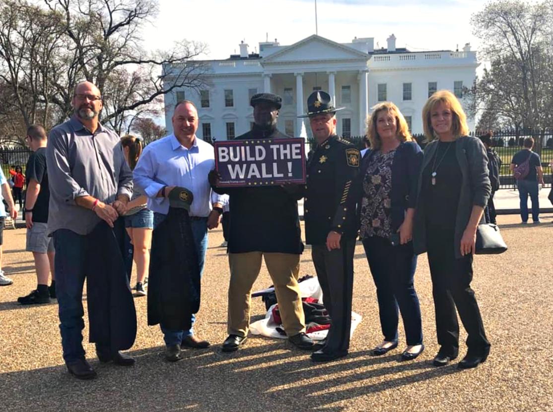 WeBuildtheWall's tweet photo. There's a #NationalEmergency at the border and we're building the wall ourselves! Angel Parents @mamendoza480 and @SteveRonnebeck were at the #VetoSigning with @terry_superman whose brother, #BORTAC Agent Brian Terry, was killed by cartel members armed with Fast & Furious guns. https://t.co/CtuEE6IDnV