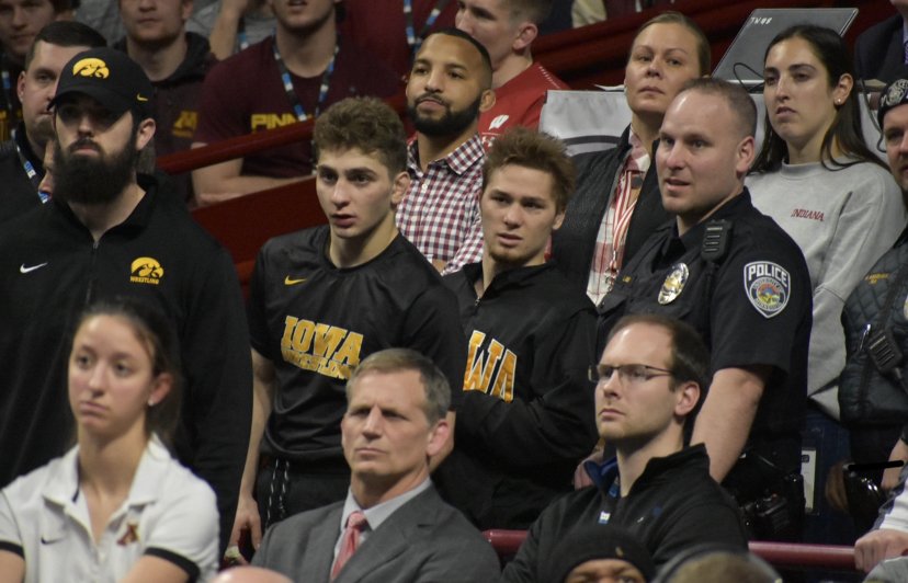 FloWrestling's tweet photo. Under-appreciated storyline: Lee and DeSanto both ended their B1G tournaments with heart-breaking losses, but both came back into the arena to watch The Bull from the stands. https://t.co/FHVbHmdkKq