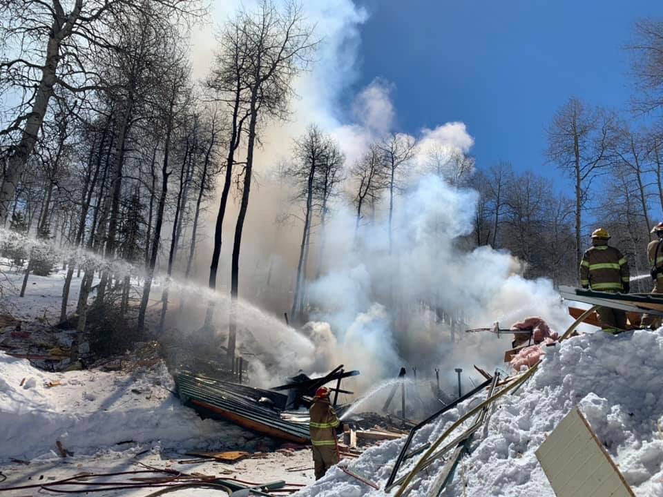 SLCScanner's tweet photo. #Breaking #WasatchCounty #TimberLakes Crews Responded to a reported explosion at a home after receiving multiple calls. On arrival they found roof collapsed and debris was blown over 200ft away/around the cabin. No injuries were reported. Pics courtesy #WasatchCountyFire https://t.co/5DOxSQNb4l