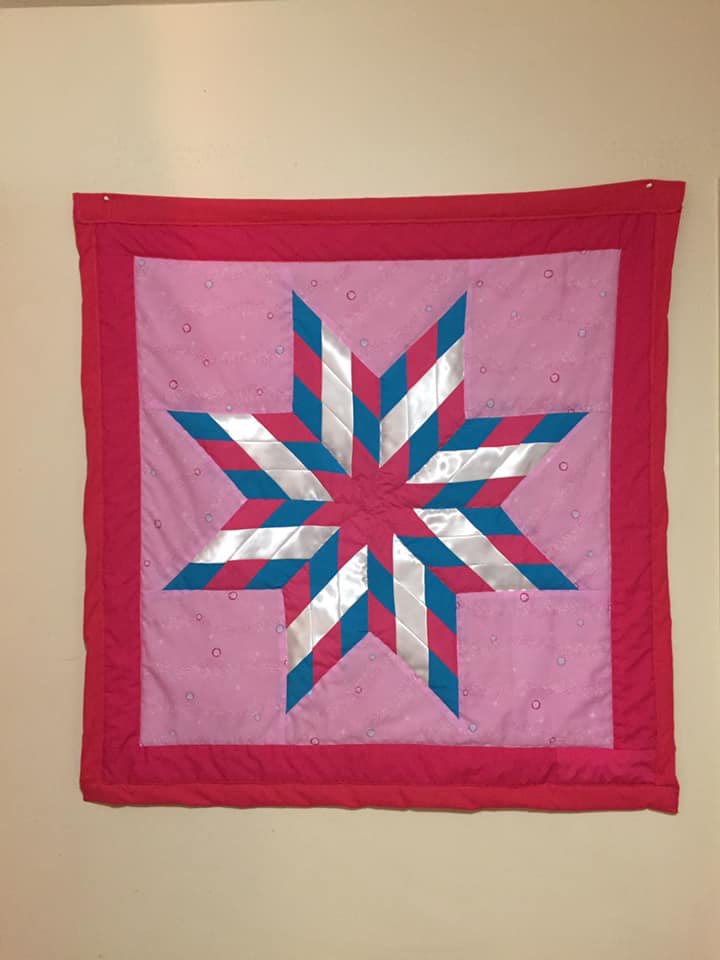 This beautiful quilt was handmade by First Nations Artist Thelma Merrick! She is as beautiful as her work. She is based in Portage Le Prairie Manitoba.   Message her on Facebook here: facebook.com/profile.php?id…. #firstnationsartist #FirstNations #bossbabesunite #handmadeworks