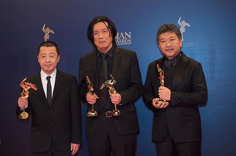 AshPurestWhite's tweet photo. Congrats to Jia Zhangke, who won Best Screenplay for ‘Ash is Purest White’ at the 13th annual Asian Film Awards, held today in Hong Kong. Jia is pictured w/ fellow winners, Lee Chang-dong (Best Director ‘Burning’), Hirokazu Kore-eda (Best Film ‘Shoplifters’). #AsianFilmAwards https://t.co/dJdZ24Kvs8