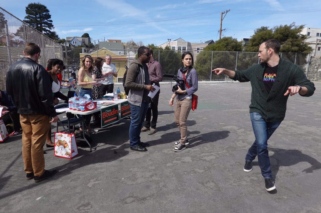 Table for people helping drop lit for Chesa Boudin (right) in Bernal Heights