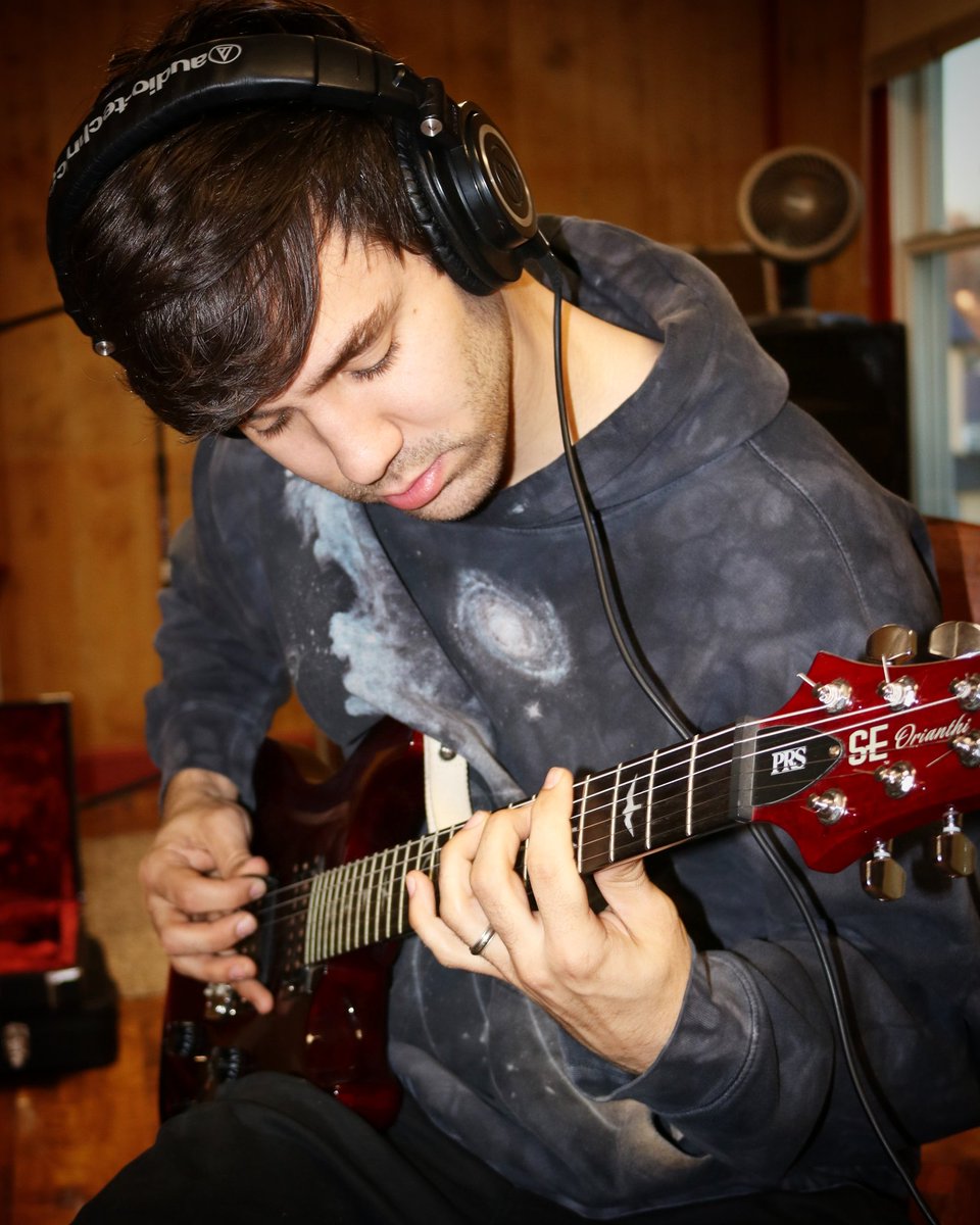 We recorded guitars for a new song tonight 🎸😬