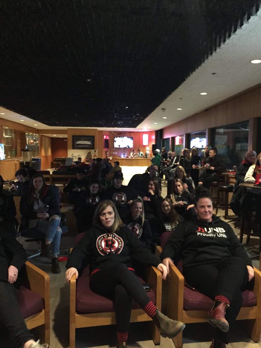Fans cheering on the UNB Reds Hockey Team competing for gold. #proudlyunb #GoReds