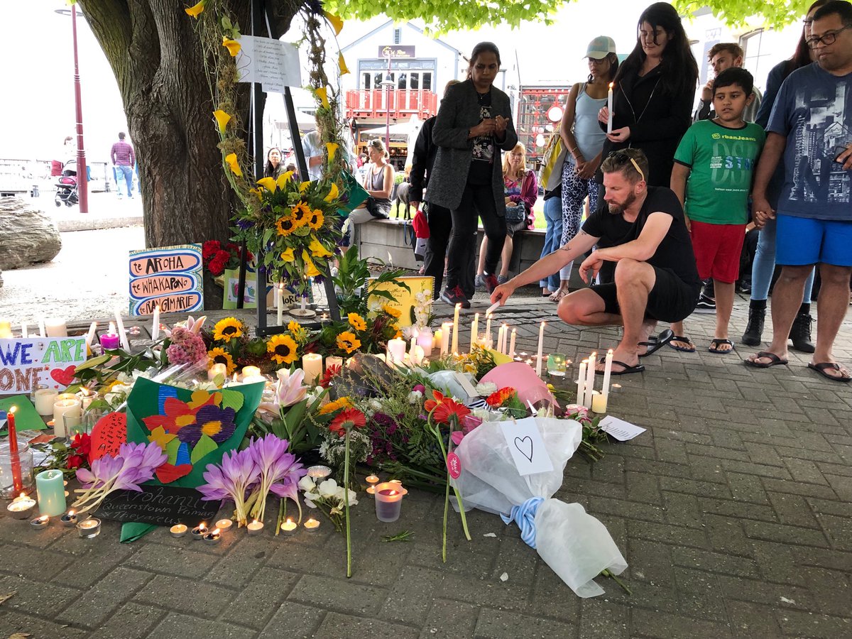 AggieAlvez's tweet photo. At a vigil in Queenstown NZ to honor those who lost their lives and loved ones in #Christchurch https://t.co/4wX9LUkEvG