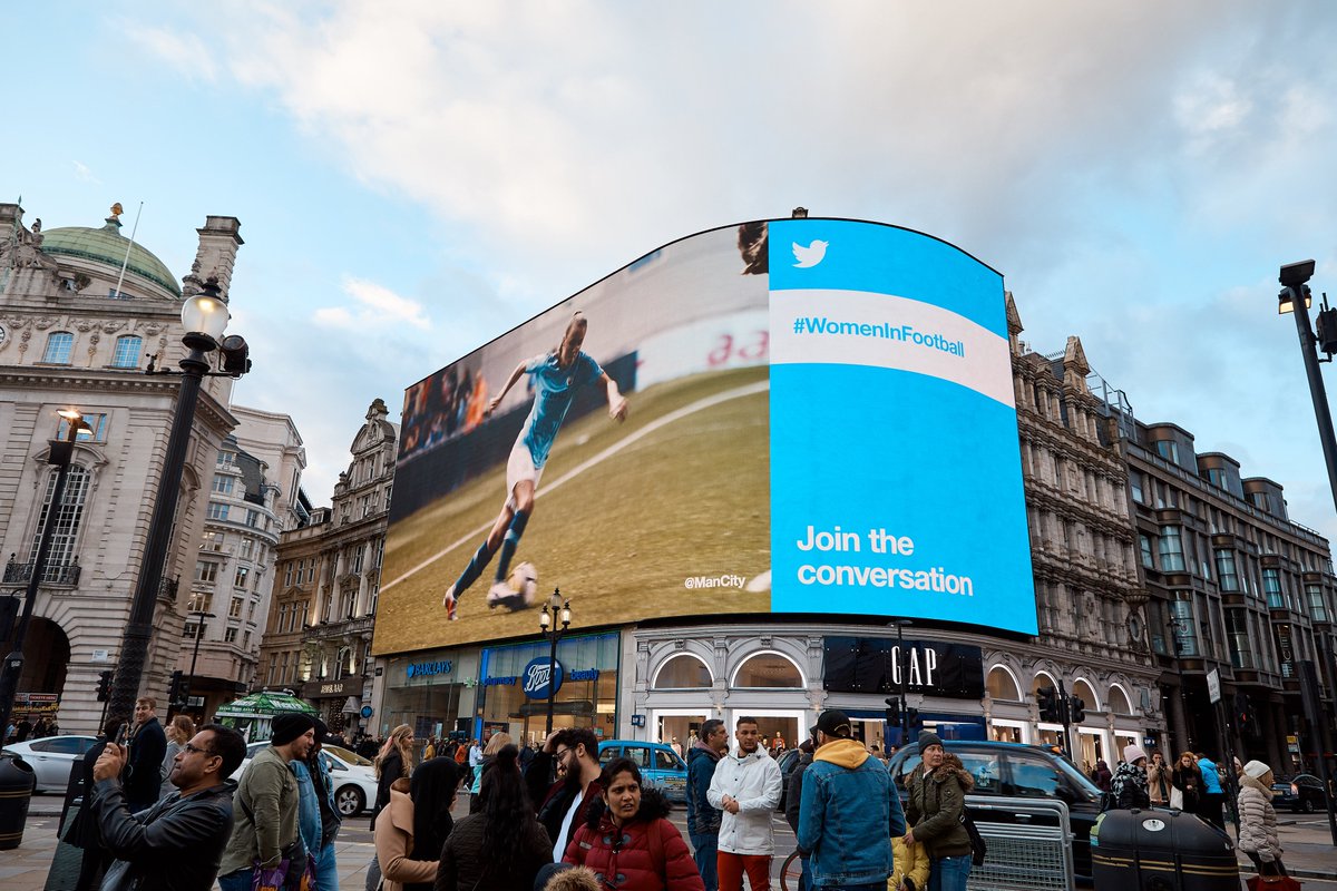 ManCity's tweet photo. Delighted to team up with @TwitterUK to celebrate the incredible work of women in football ⚽️

And even prouder to see our performance analyst @RoyaArabshahi's story on show in Piccadilly Circus this weekend! 💻

#WomenInFootball 

🔵 #mancity https://t.co/N6Kq2sV921