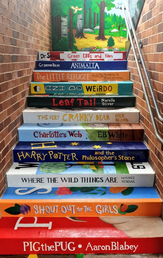 teach_swright's tweet photo. We are all in love with our newly painted stairs to the library! Great selection of texts and the artwork is incredible 😍 @BirrongPS #library #educhat #aussieED https://t.co/cntKyUdw0x