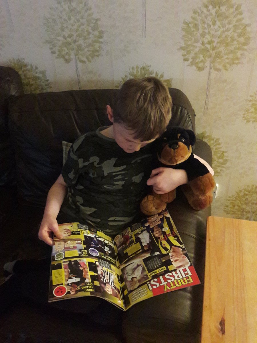 JenniferHutton8's tweet photo. @deacon_mrs @CarronPrimary Oscar sharing the latest football news with Rocky #CPSread https://t.co/iVFqNRHPsB